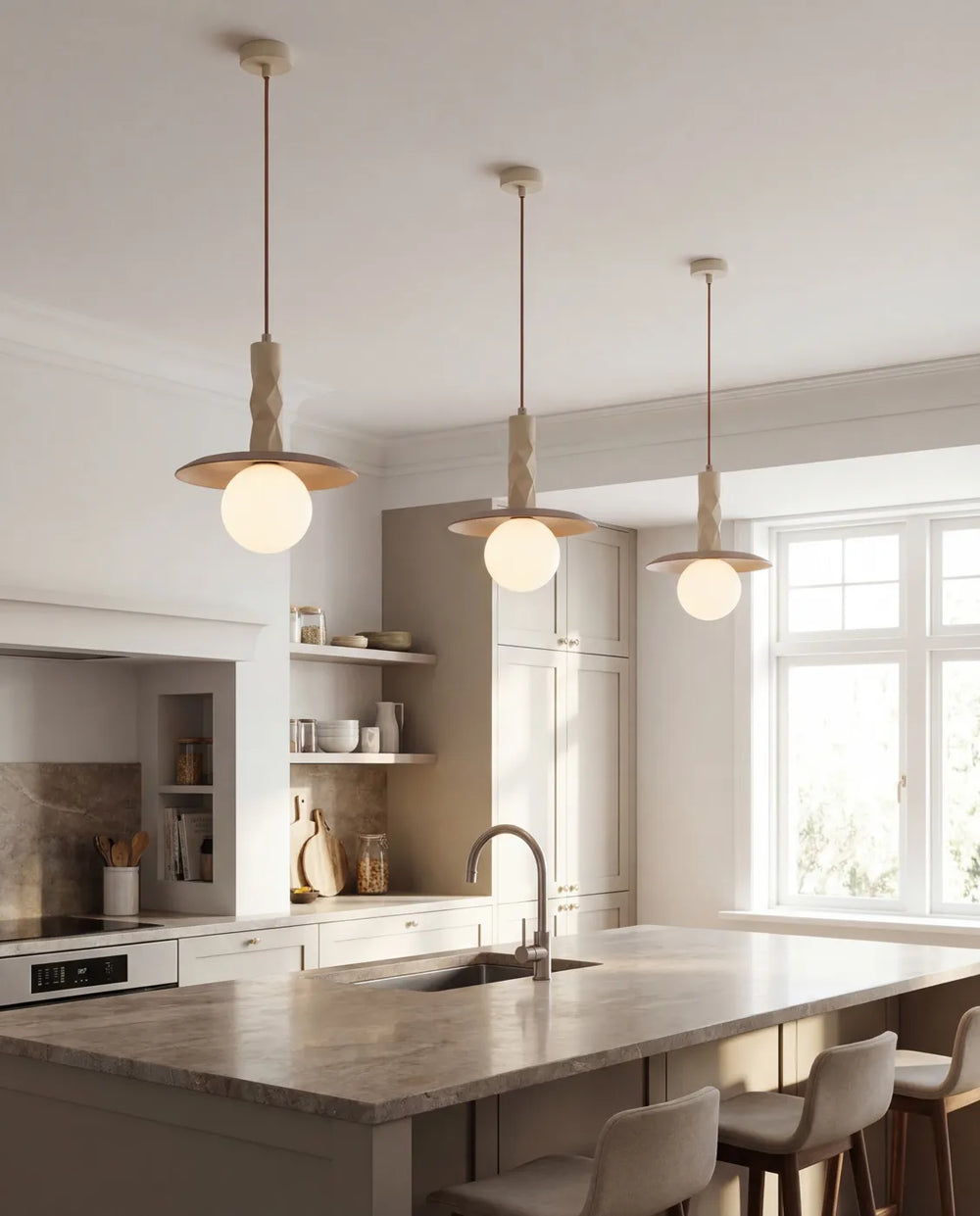 Three Sono pendants over a kitchen island